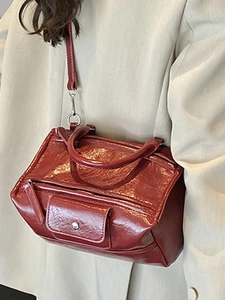 French style dark red handbag in geometric shape with top handle and shoulder strap