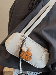 White vintage faux suede underarm bag with cute teddy dog pendant and vertical stitching
