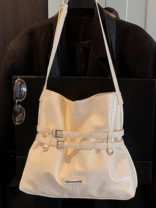 Minimalist cream white tote bag with glossy pleated leather and silver buckle details