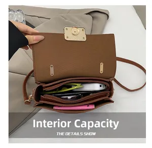 Top view showing the spacious interior and multiple compartments of this brown crossbody bag