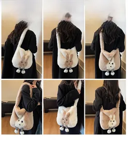 Chic plush bunny shoulder bag with long ears and striped legs shown on a fashion model