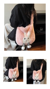 Detailed view of pink plush rabbit tote bag with striped legs and soft faux fur texture