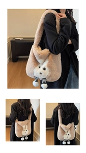 Close-up of fluffy plush bucket bag with cute 3D rabbit ears and striped leg details