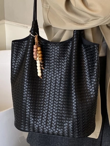Handcrafted woven black leather tote bag with vintage bead charm and large capacity