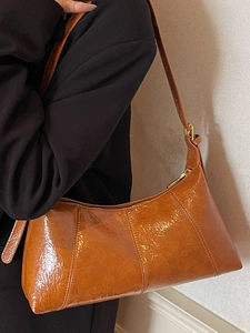 Caramel brown oil wax leather baguette bag with adjustable strap for women in 2025