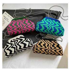 Detail view showing four wave-knit crossbody bags in pink, blue, black, and brown striped patterns