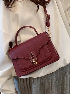 Chic burgundy lychee texture crossbody bag with gold buckle for autumn fashion style