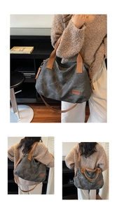 Detail of the gray canvas tote bag featuring adjustable brown leather strap and logo