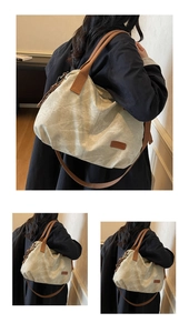 Detail of spacious vintage canvas tote bag showing the texture and brown strap layout