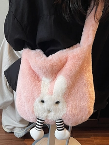 Chic pink plush rabbit crossbody bucket bag with fuzzy texture and cute 3D ears