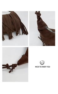 Detail of suede fringe shoulder bag with long tassels and knotted rope strap