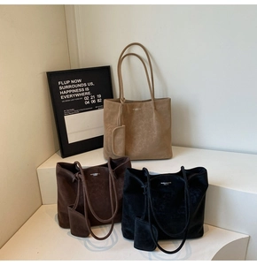 Three minimalist suede tote bags in khaki, dark brown and black with matching pouches