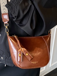 Retro dark brown crossbody bag with jacquard wide shoulder strap and metal hardware