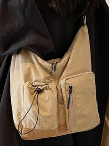 Nylon crossbody bag with large capacity and multi-pocket utility design in khaki beige