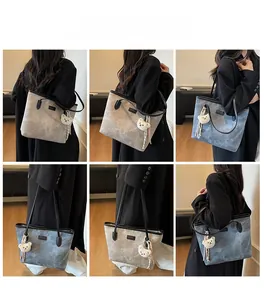 Detailed model views of large tote bag with bear charm and matte texture finish