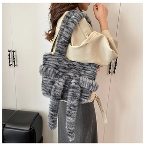 Fashionable tiger print faux fur tote bag showing the soft plush texture and wide shoulder strap