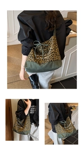 Detail of leopard print tote bag featuring green canvas patchwork and drawstring bow knot