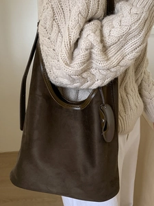 Deep coffee frosted faux suede tote bag with brown leather trim shown from a 45-degree angle