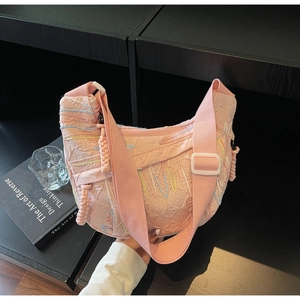 Pink crescent crossbody bag with colorful wave embroidery and wide fabric strap