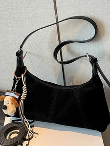 Vintage black oil wax leather hobo crescent bag with plush charm and long strap