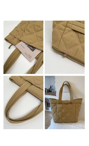 Makro-Detail der khakifarbenen Stepptasche mit robustem Reißverschluss und geräumigem Fach