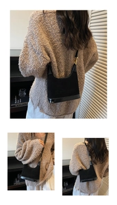 Détails du sac bandoulière noir en daim mat et cuir verni brillant style dumpling