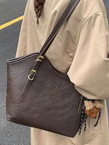 Deep brown vintage tote bag with large capacity and adjustable gold buckle straps