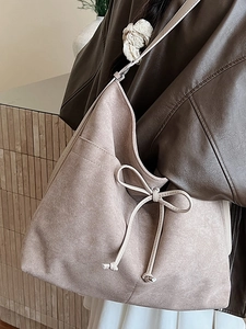 Grand sac hobo vintage en daim abricot avec nœud élégant et cordon de serrage