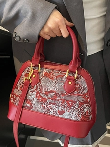 Elegant red shell-shaped handbag with Chinese style embroidery and gold hardware
