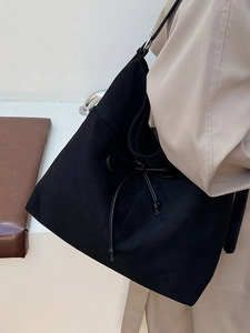 Grand sac cabas noir en toile avec nœud décoratif et bandoulière tissée pour femme