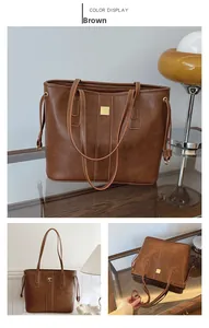 Detail view of brown faux leather tote bag showing side drawstring and gold buckle