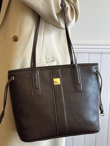 Deep brown matte PU leather tote bag with gold metal plaque and side drawstring