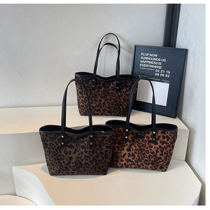 Detailed comparison of three leopard print tote bags in brown, tan and grey color tones