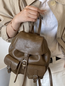 Brown vintage PU leather backpack with buckle pockets for women's casual fashion