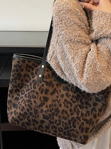 Chic leopard print tote bag for women with large capacity and stylish metal rivet details
