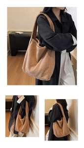 Detailed view of brown faux shearling tote bag with wide shoulder strap for autumn and winter
