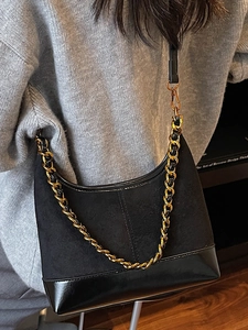 Retro black patchwork hobo bag with gold chain strap and suede-leather texture contrast