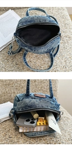 Detail view of denim backpack showing washed fabric texture and interior storage capacity