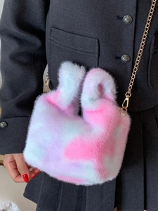 Pink and white plush faux fur mini handbag with golden chain strap and top handles