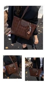 Close-up of retro brown tote bag with quilted suede texture and donut charm detail