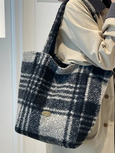 Classic black and white checkered plush tote bag with handmade metal tag for women