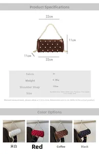Detail showing the size specifications and pearl handle of the cylinder shoulder bag