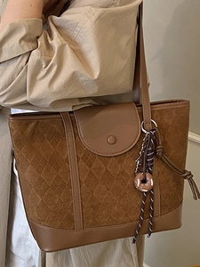 Vintage dark brown suede tote bag with embossed diamond patterns and round buckle