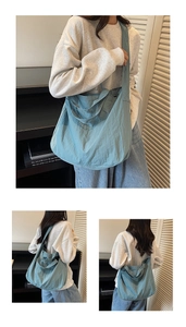 Detail of blue tote bag with wide shoulder strap showing texture and versatile carrying ways