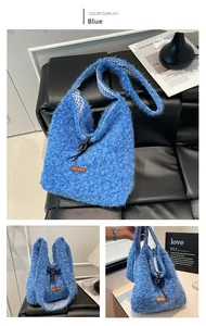 Detail view of blue plush tote bag featuring drawstring closure and soft fur texture