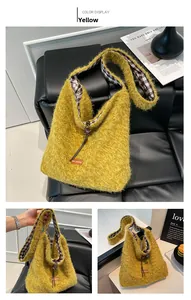 Close-up of yellow fuzzy tote bag with check lining and soft faux fur texture