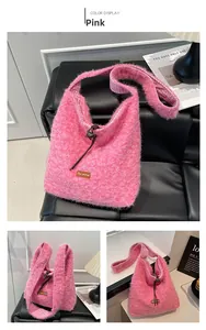 Detail of pink faux fur tote bag with Star-picking leather tag and drawstring closure