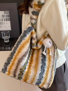 Fuzzy vintage Maillard style plush tote bag with colorful abstract stripes and a cute charm