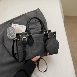 Sac à main en denim gris foncé avec poignées en cuir et petit porte-monnaie assorti