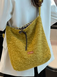 Yellow faux fur tote bag with plaid lining and Star-picking patch for casual commuting